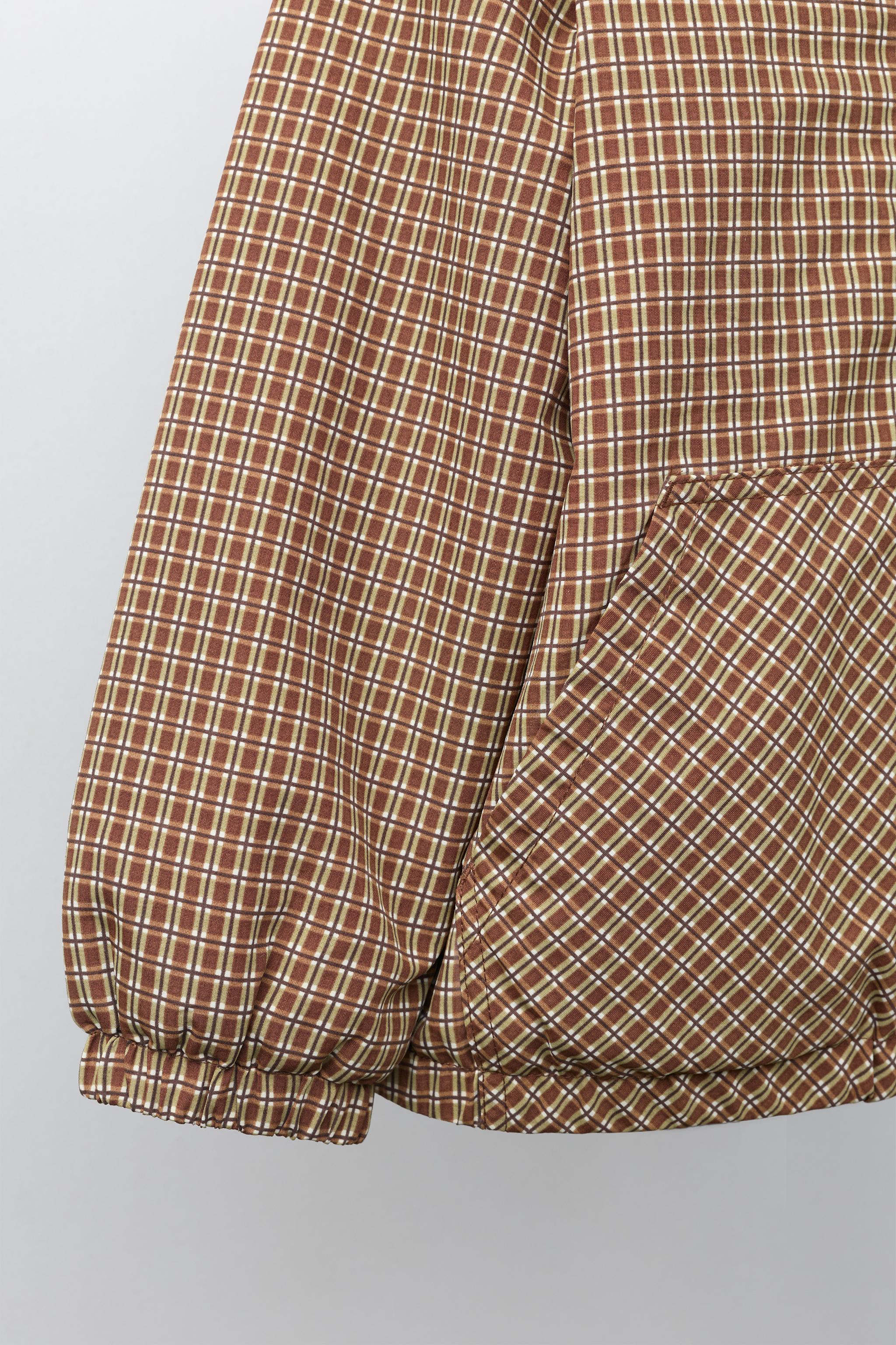 BLOUSON À CAPUCHE CARREAUX